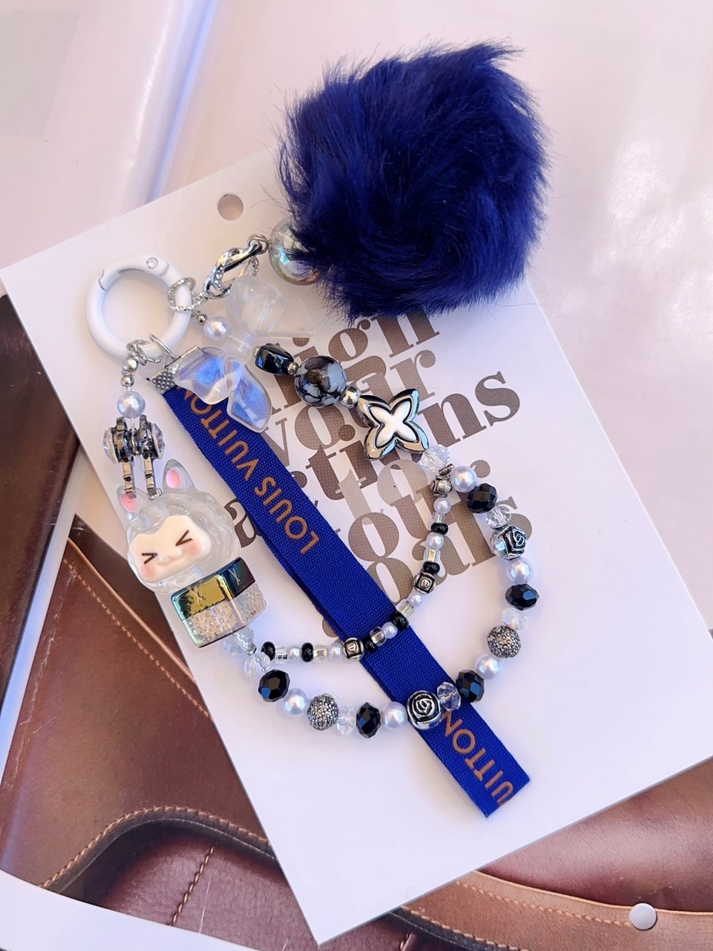 Authentic Louis Vuitton Royal Blue Ribbon with unbranded Beaded Bag Charm & Pom